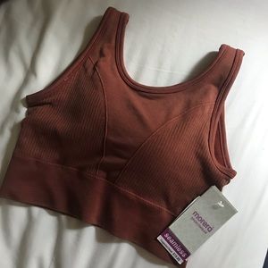 Dark coral colored padded sports bra